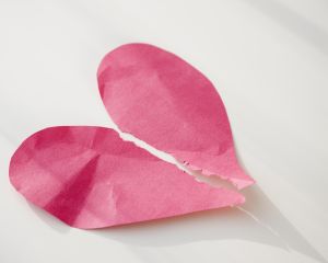 Paper heart ripped in half