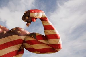 Flexing biceps covered with American flag